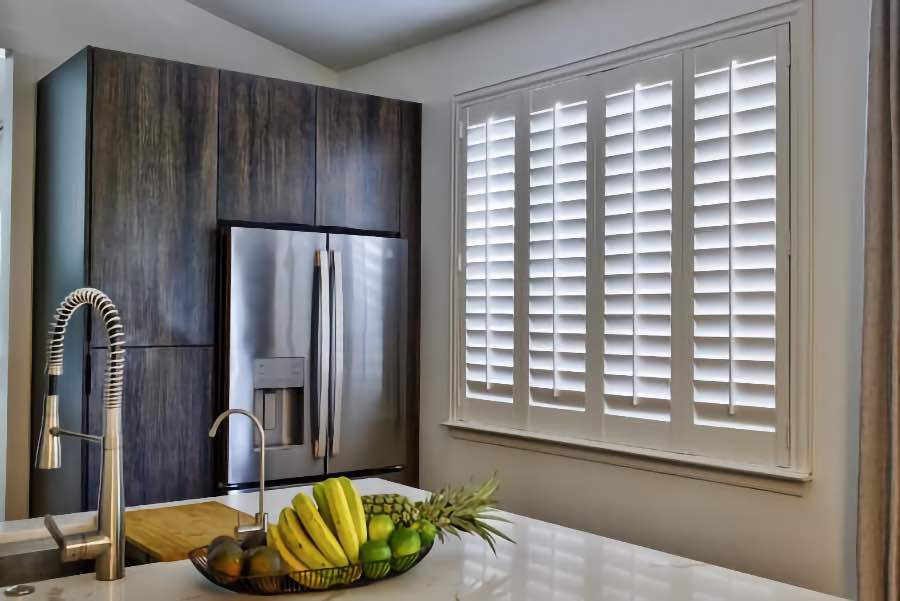 Polywood shutters on a large kitchen window